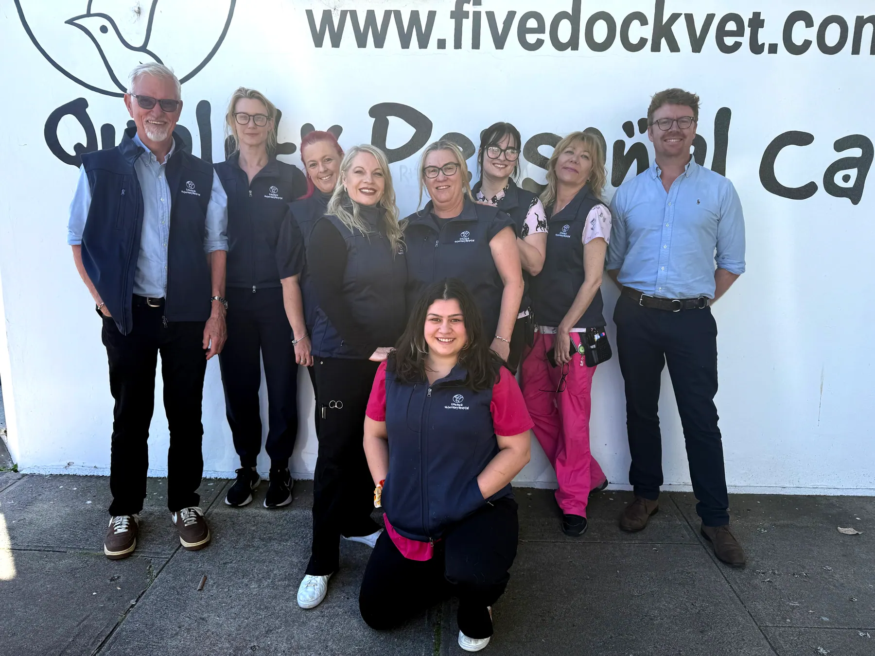The Five Dock Veterinary Hospital team standing in front of the clinic